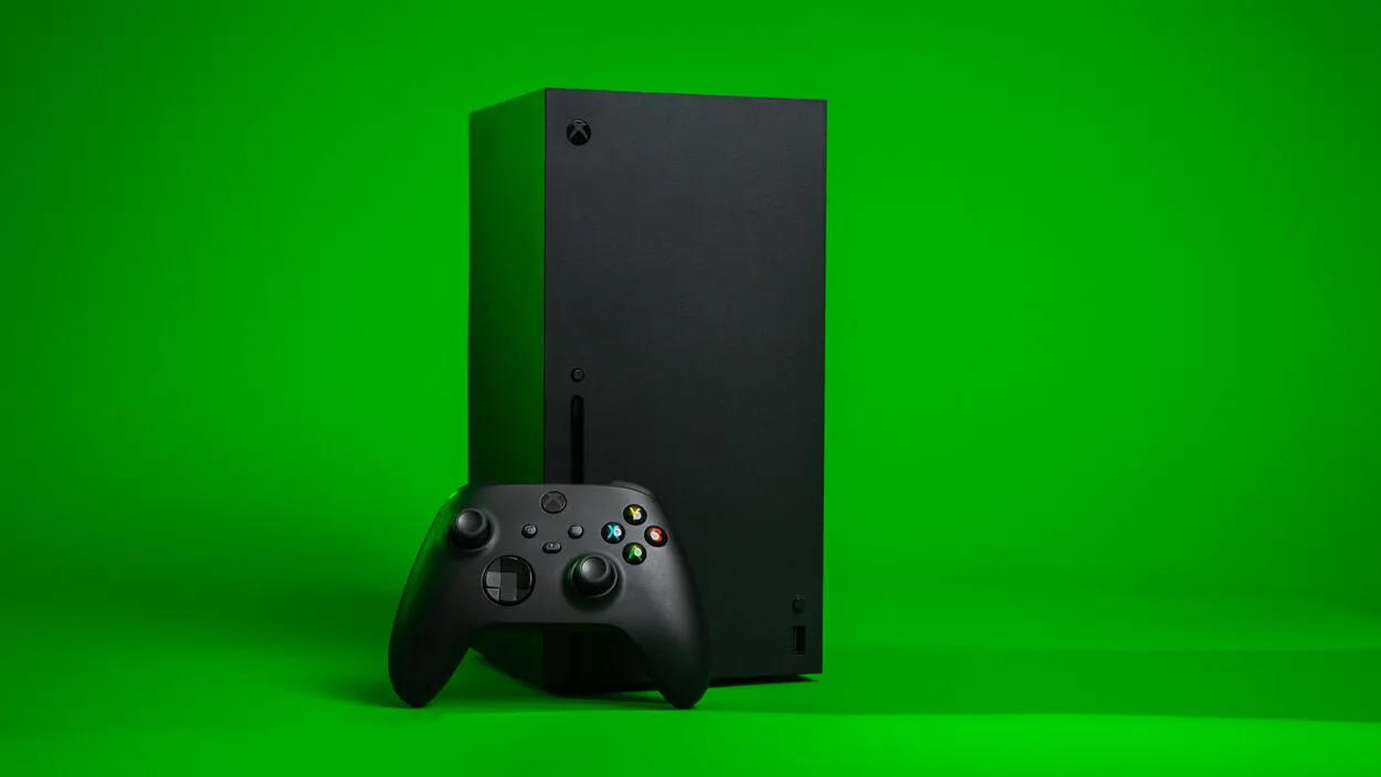 Musta Xbox vihreällä taustalla