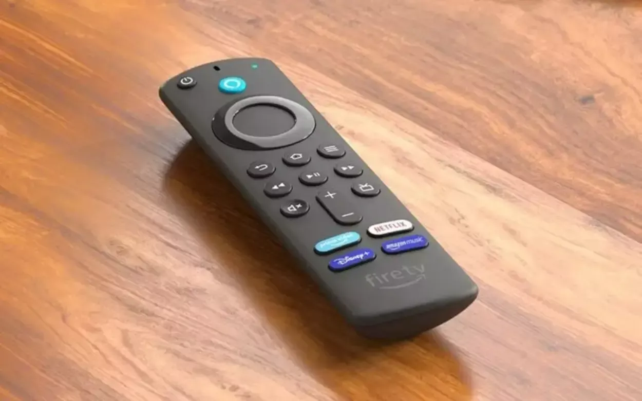Fire TV Remote on a wooden table.