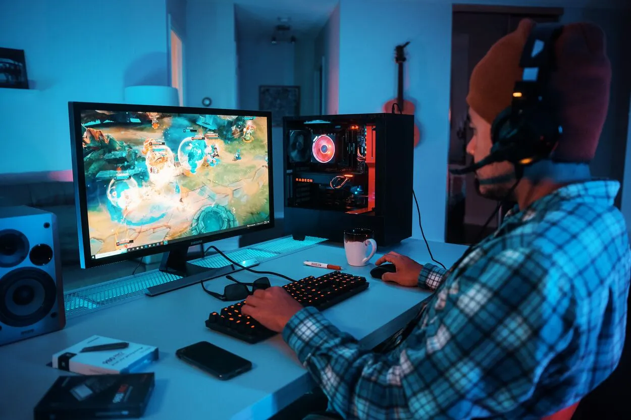 A man Playing Dota 2 on his gaming PC.